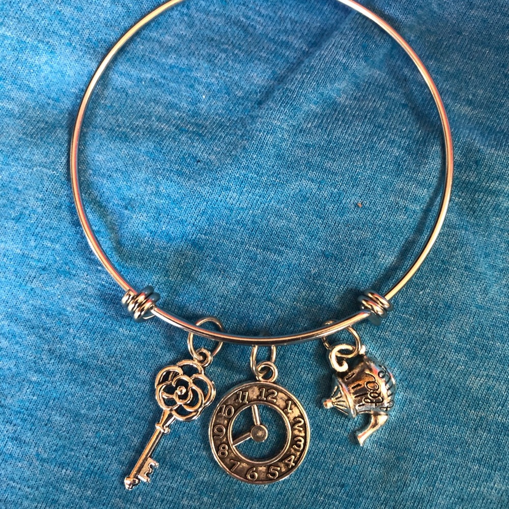 NWT, Handmade by A Charmed Life. Stainless Steel, Adjustable bracelet.